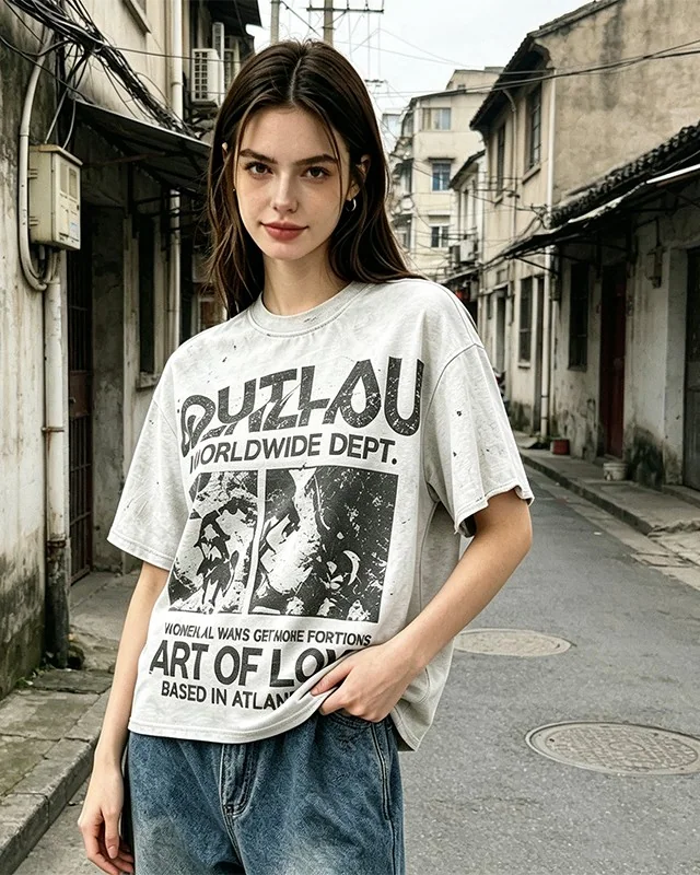Model wearing a washed heavyweight graphic tee from our sample collection